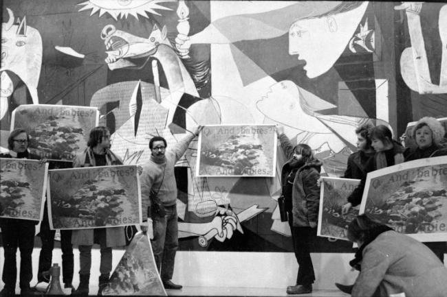 Jan van Raay, The Art Workers' Coalition and Guerrilla Art Action Group protest in front of <em>Guernica</em>, MoMA, New York, January 8, 1970