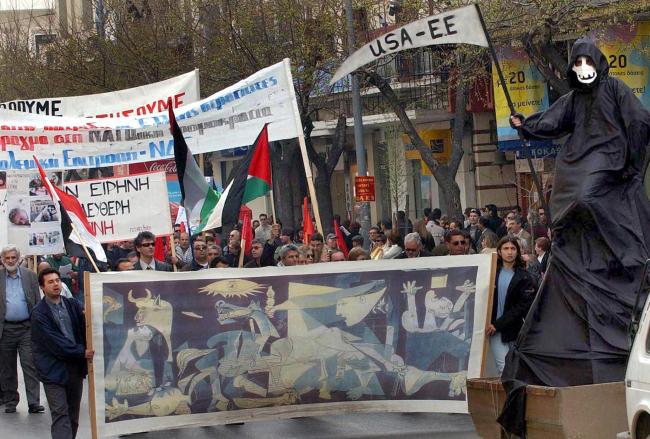 EN Demonstrators holding Iraqi and Palestin