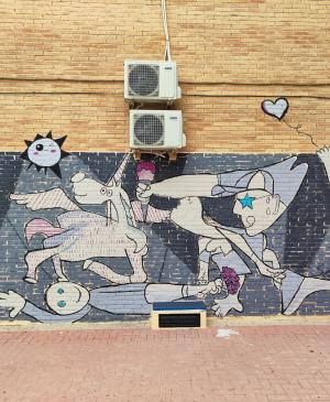 Obra Mural "El Guernica feliz" por Sbah